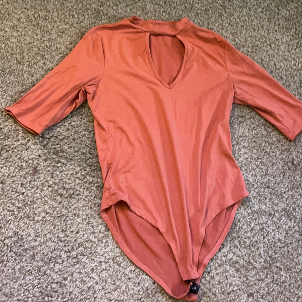 Pink v cut body suit